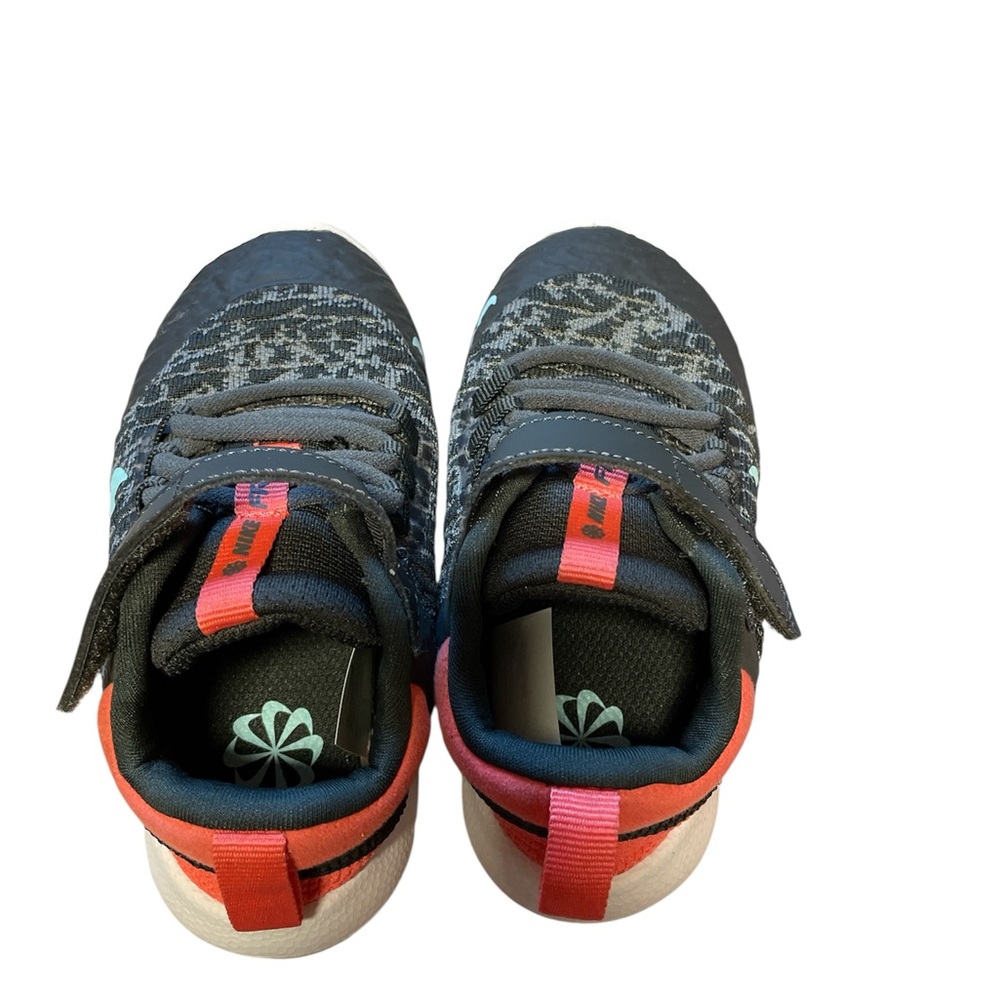 Nike Kids Black and White Sneakers with Orange Accents. - Picture 4 of 6